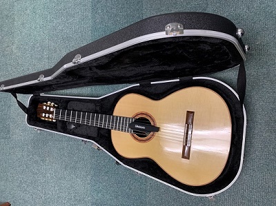 A Classical guitar in its case